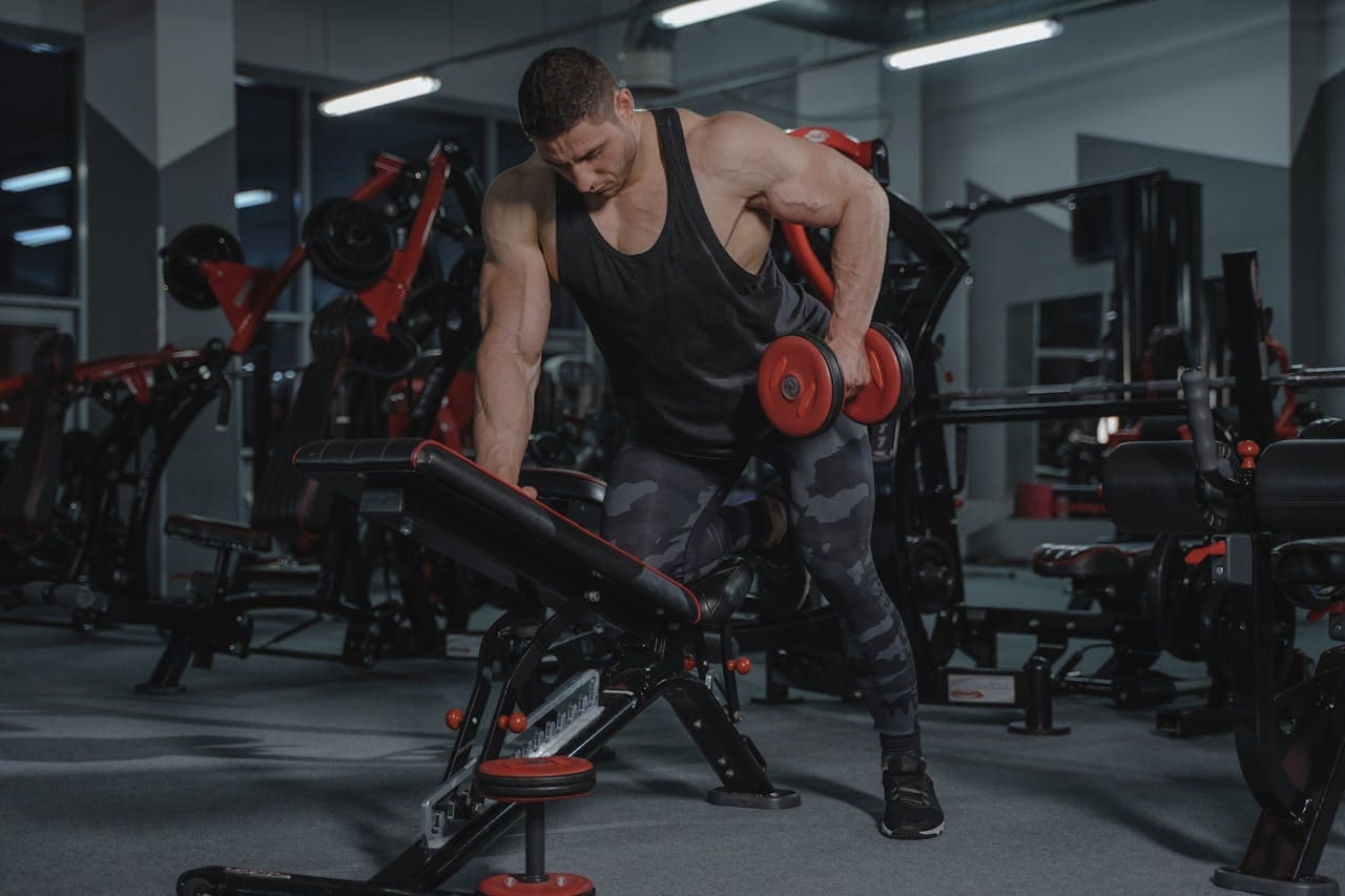 A Bodybuilder Working Out at the Gym A Bodybuilder Working Out at the Gym